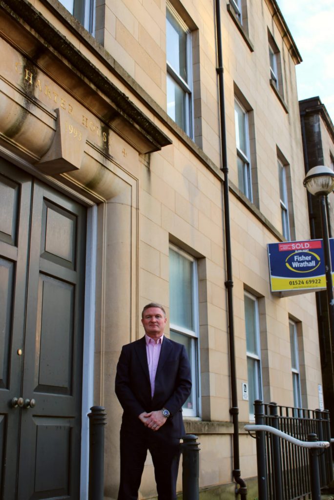 Marcus outside Charter House