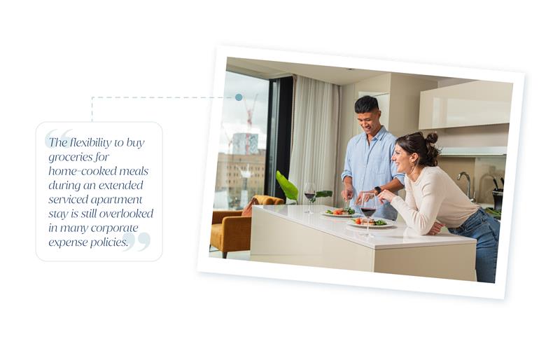 Image showing two people eating a home-cooked meal in their serviced apartment