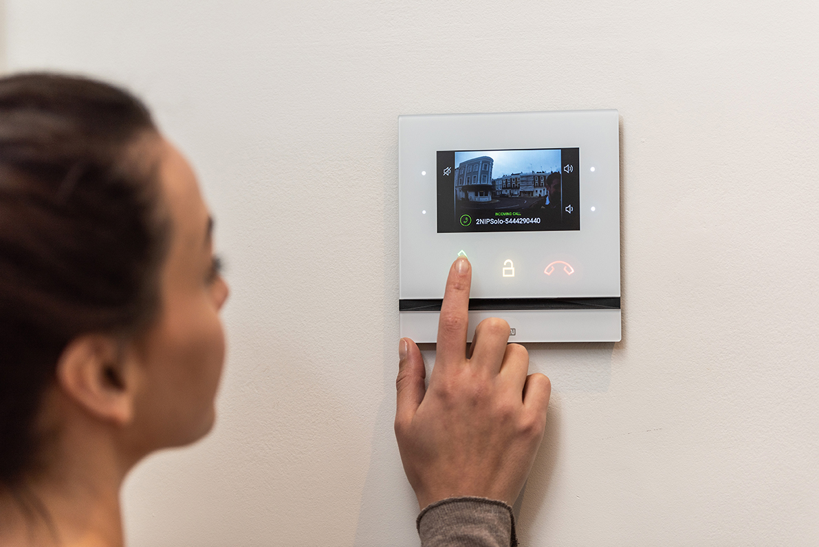 Person checking ring doorbell camera footage