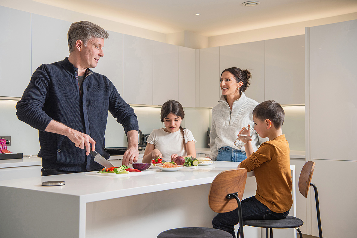 Family cooking in a kithcen