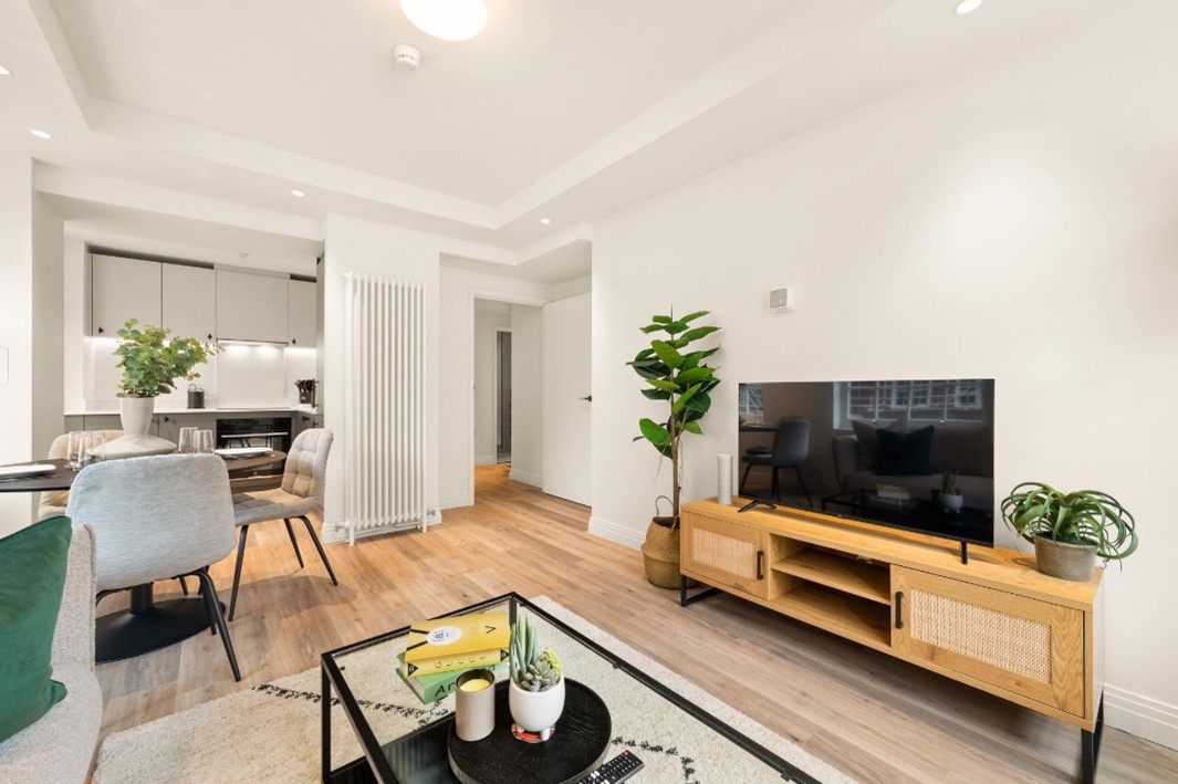 Modern, light and spacious living area serviced apartment interior
