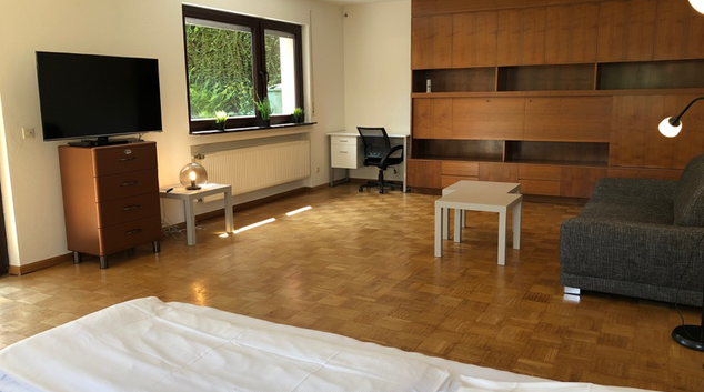 Living room at Studio Garden Apartment