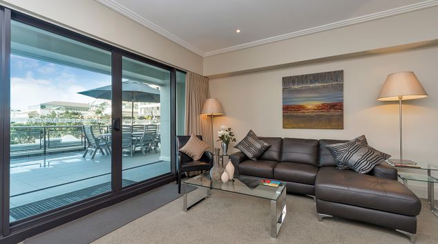 Living room at The Quays Apartment, Queens Wharf, Auckland