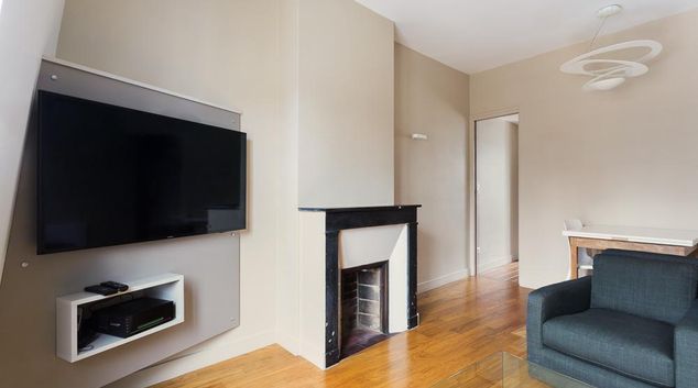 TV at Living area at Corporate 30, Paris, France