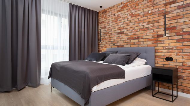 Double bed at Apartment Warsaw CityLink, Młynów, Warsaw