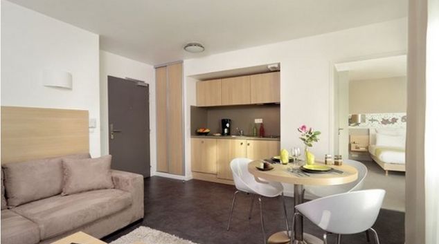 Spacious living area at Vélizy Apartments