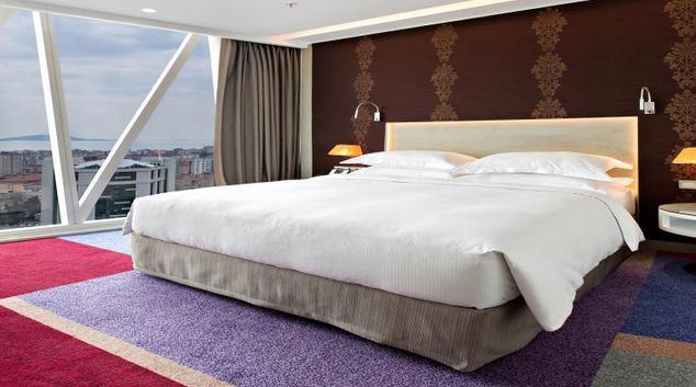 Comfy bedroom at Burgu Arjaan Apartments