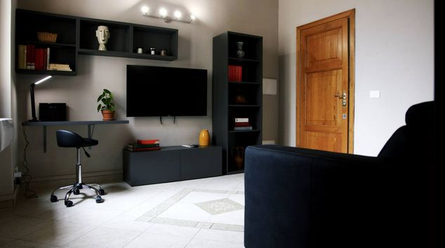 Living room at Fiume Apartment, Prati, Rome