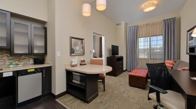 Living area at Staybridge Suites Rochester - Commerce DR NW, Elton Hills, Rochester